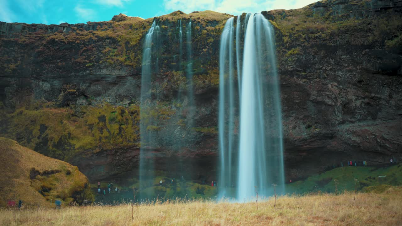 Seljalandsfoss waterfall in Iceland in the South Region in autumn - long exposure time lapse