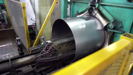 bending steel sheet into a cylindrical geometry