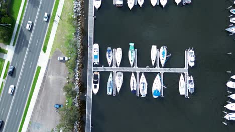 drone aerial waterfront boat yacht sailing dock wharf waterfront roads cars transport street catalina batemans bay south coast tourism travel australia