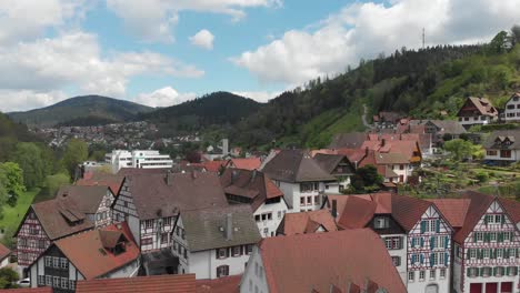 Aerial-view-of-typical-half-timbered-german-houses-in-village-among-valley