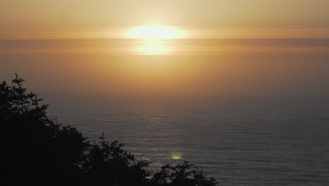 sun setting on the horizon in california