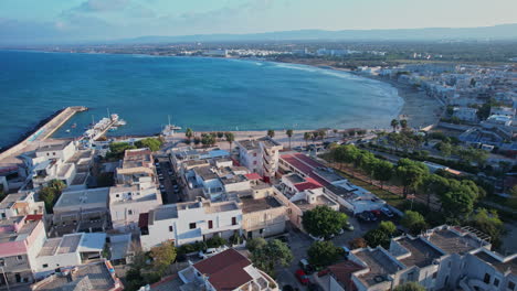 an aerial view of a city next to the adriatic sea