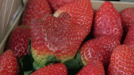 tasty strawberries in box
