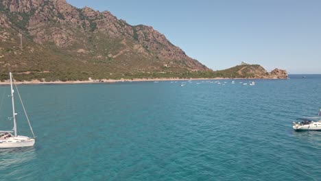 Drone-Fly-Over-White-Boats-at-Crystal-Tropical-Sea