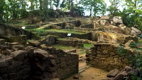 ancient stone structures in the ruins of castro cibdá de armeá, ourense, galicia