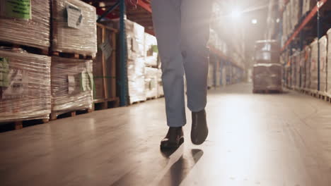 warehouse interior with shelves and worker