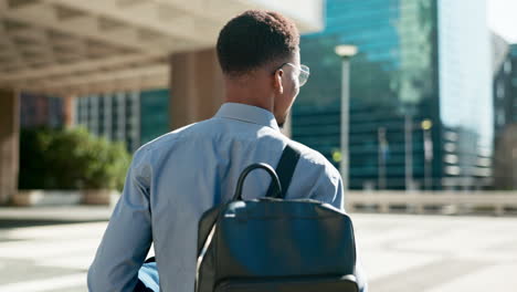 city, back and business person walking on outdoor