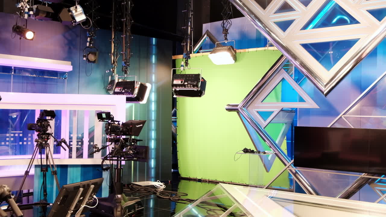 CHISINAU, MOLDOVA - 10 SEPTEMBER, 2019: Professional tv station set with screens and recording cameras and lights