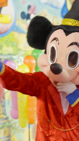mickey mouse magician character at an event