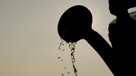 Agriculture-Watering-Can-Pouring-Water