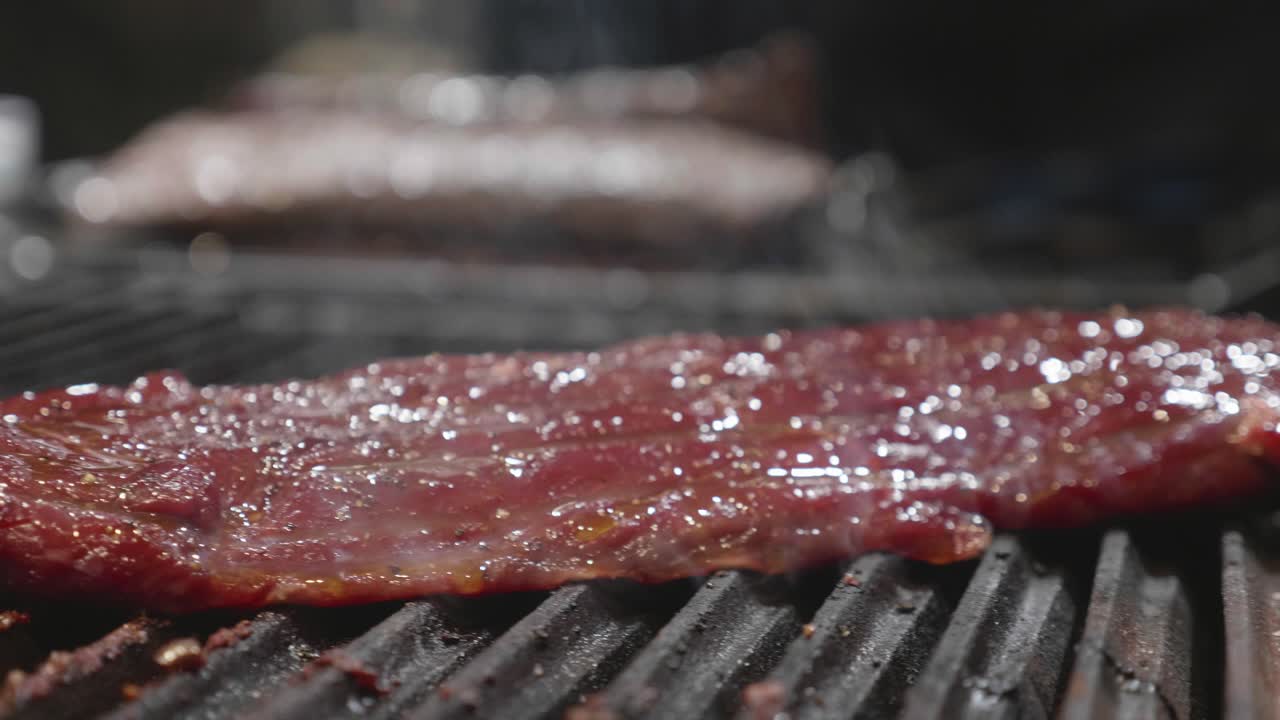 Big venison meat slice grilled on grill tray