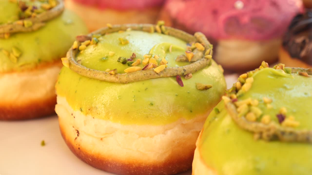 Close-up of doughnuts with pistachio icing
