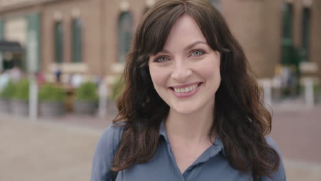 portrait-of-lovely-elegant-independent-woman-smiling-happy-confident-on-busy-urban-sidewalk