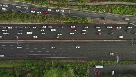 aerial top view of busy multi lane highway in auckland, new zealand