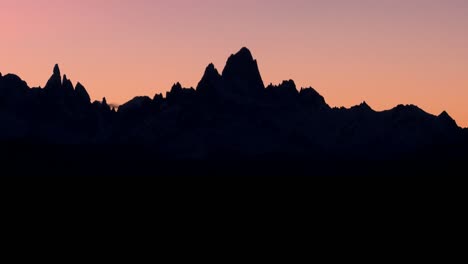 the remarkable mountain range of fitzroy in patagonia argentina silhouetted at dusk