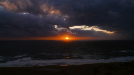 sunset after a storm on the sea in piscinas, sardinia