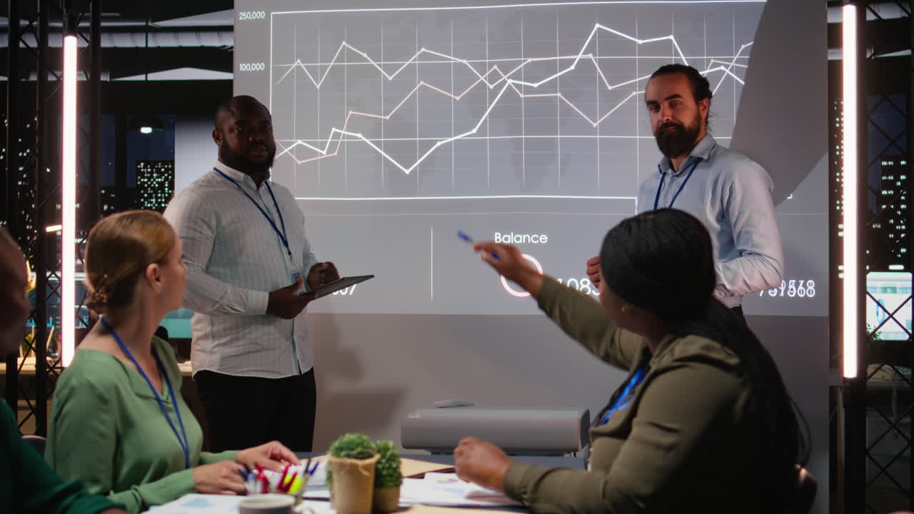 Group of business associates preparing their forecast pitch for a discussion