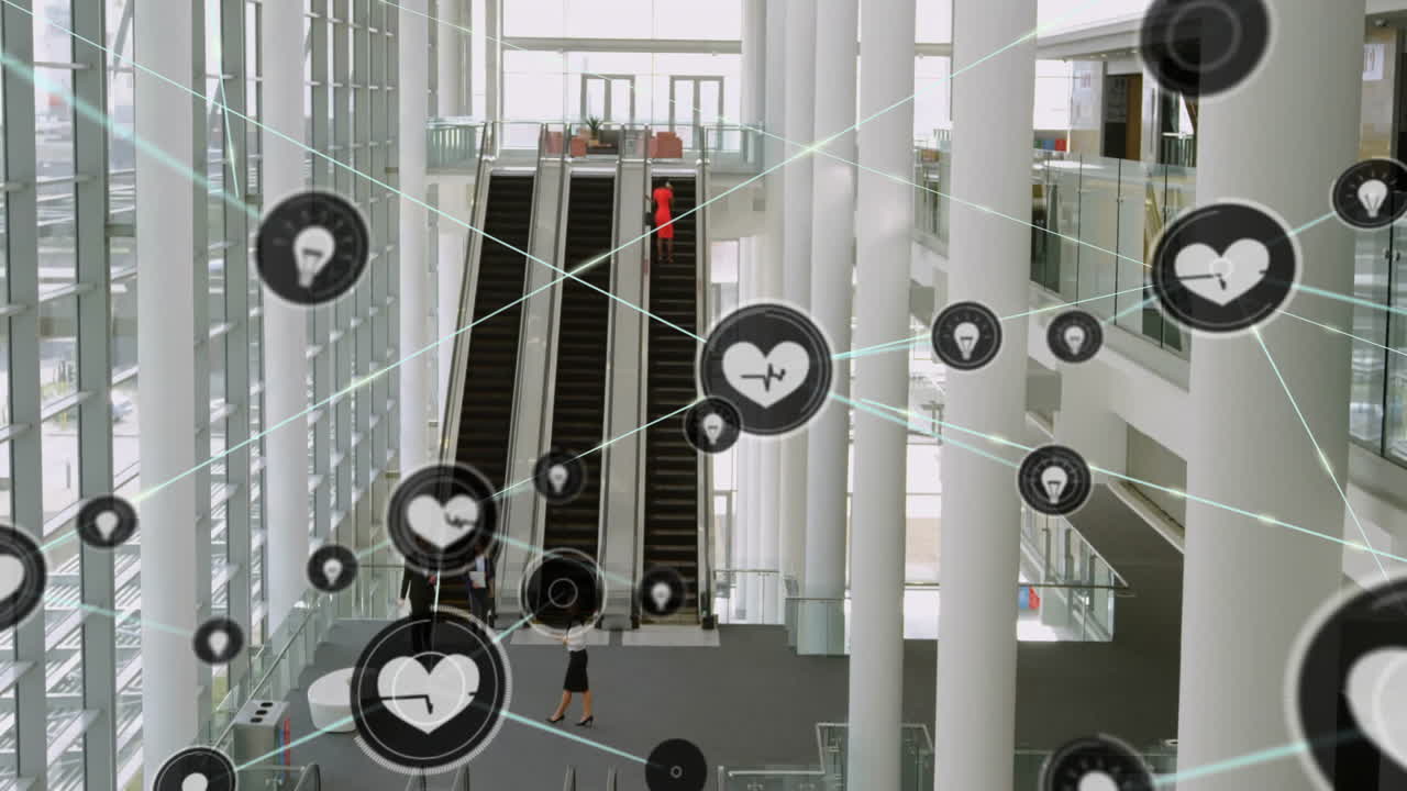 Heart rate and health data animation over people in modern office building