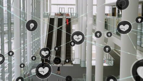 Heart rate and health data animation over people in modern office building