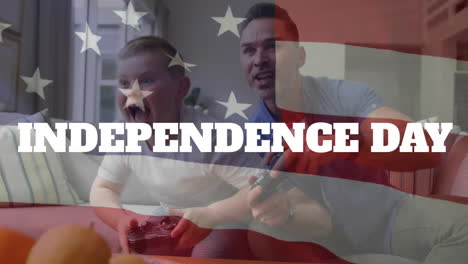 animation of independence day text over caucasian father and son playing video game at home