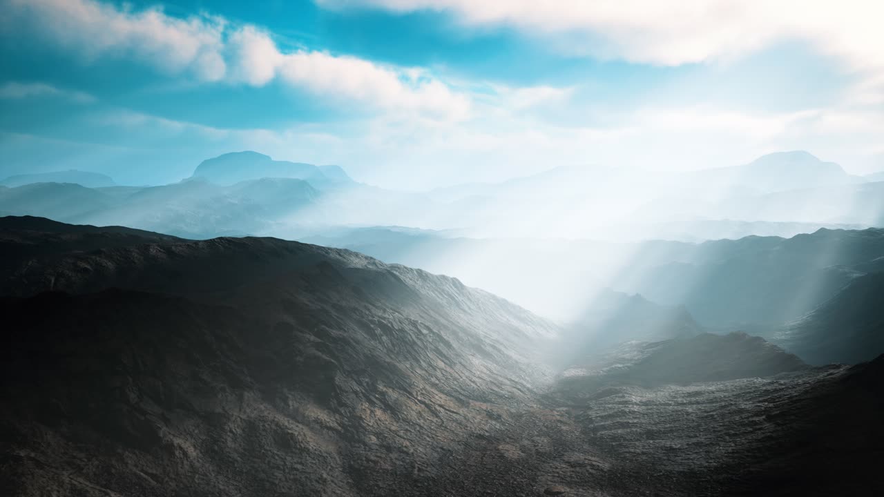 paisaje aéreo de desierto volcánico con rayos de luz