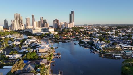 aerial view of a coastal city with canal and residential homes