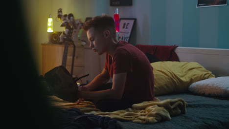 teenage boy in his bedroom