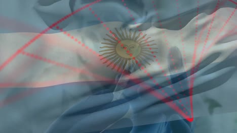 animación de la bandera de argentina ondeando sobre el médico con máscara facial y con la vacuna en la mano