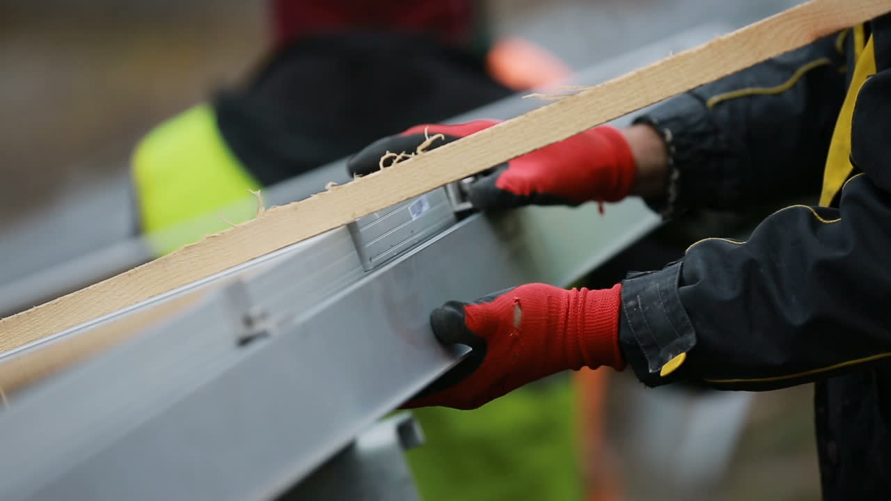 Solar power concept. VINNITSA, UKRAINE - NOVEMBER 2017: Installing alternative energy photovoltaic solar panels