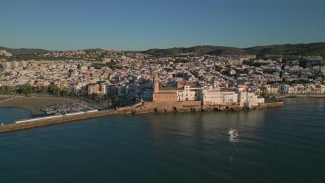 Sitges-town-Aerial-view,-San-Bartolome-and-Santa-Tecla-Church,-Barcelona