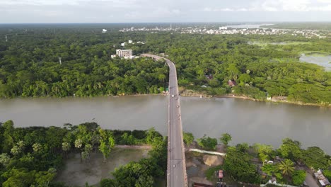 bridge connects riverbank villages from two district in bangladesh