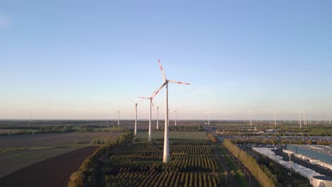 fantastic aerial view flight speed ramp hyperlapse motionlapse timelapse
of a wind turbine wheel field at brandenburg germany at summer day 2022