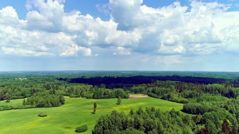 drone flyover greenery landscape lush green fields surrounded