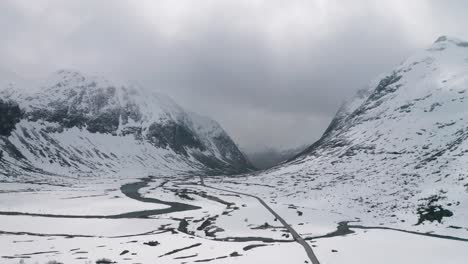 the snow-covered valley above the trollstigen road