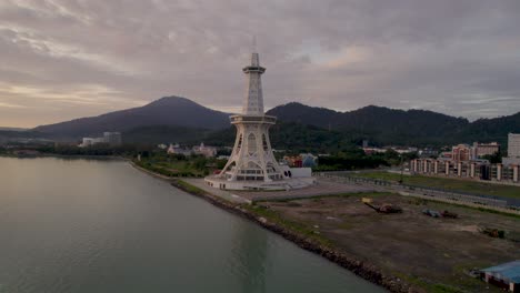 establishing shot of maha tower on the seafront of kuah city in langkawi, malaysia