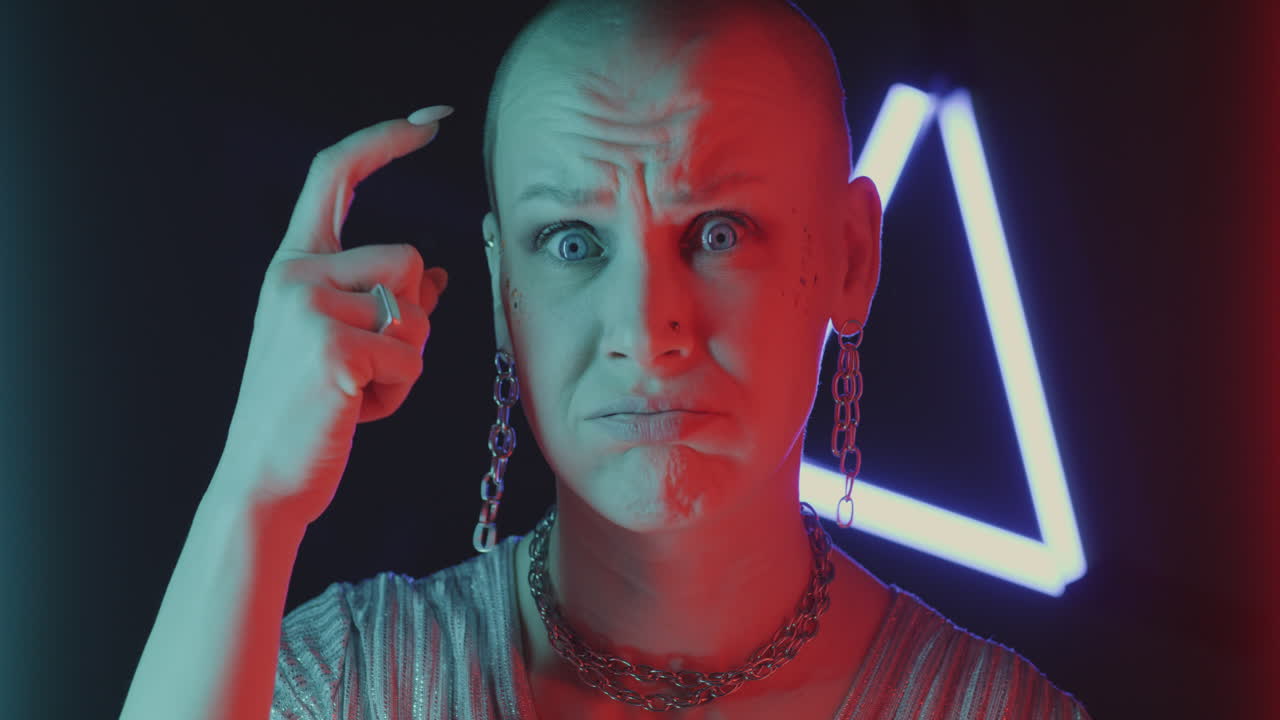 Woman with Bald Head in Neon Light