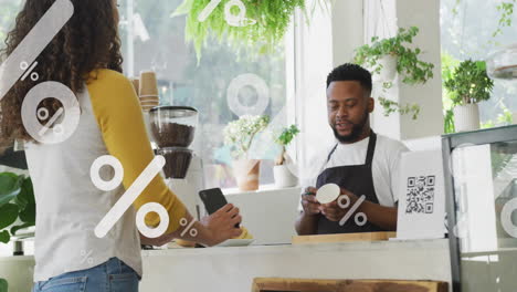 animation of percent signs over diverse people in coffee shop