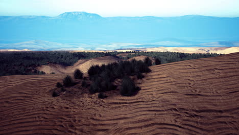 stunning landscape view of rolling hills and distant mountains under clear sky