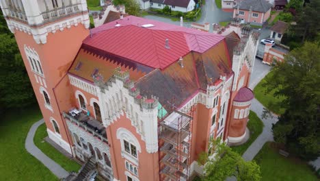 rotenturm castle from above in austria with scaffolding on side