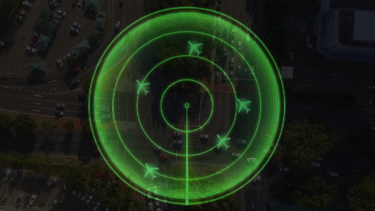 Animating green radar over aerial view of urban traffic in city