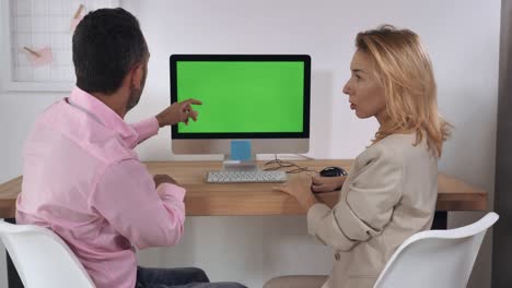 meeting in room with white wall and casual interior.