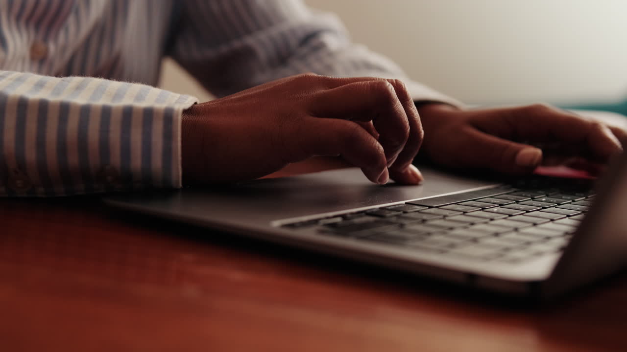 Woman Using Laptop Trackpad