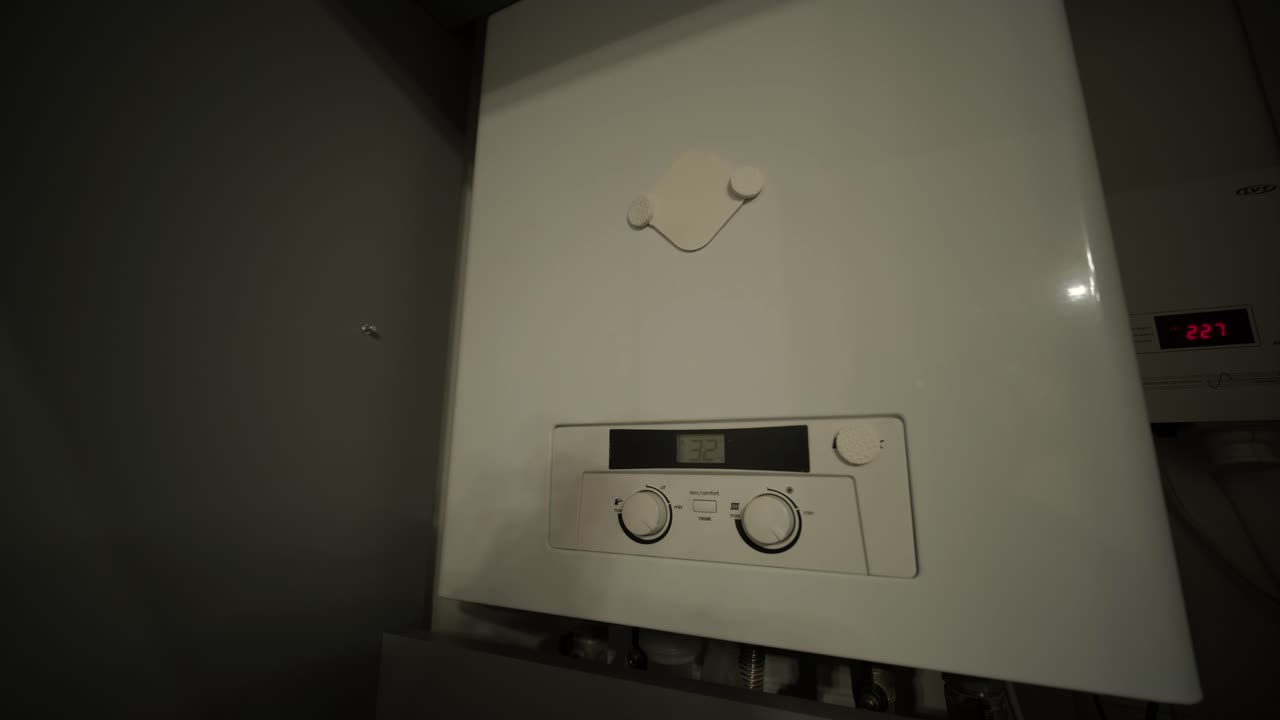 Modern White Gas Boiler Operating with Digital Display