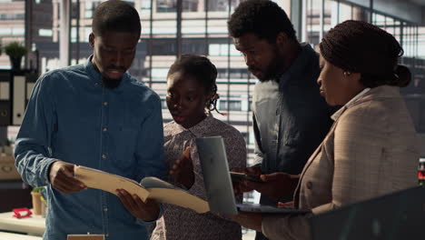 diverse team discussing project in modern office