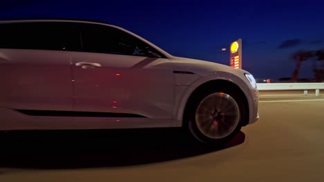 presentation of a white audi e-tron, compact luxury crossover suv. modern new cars for sale