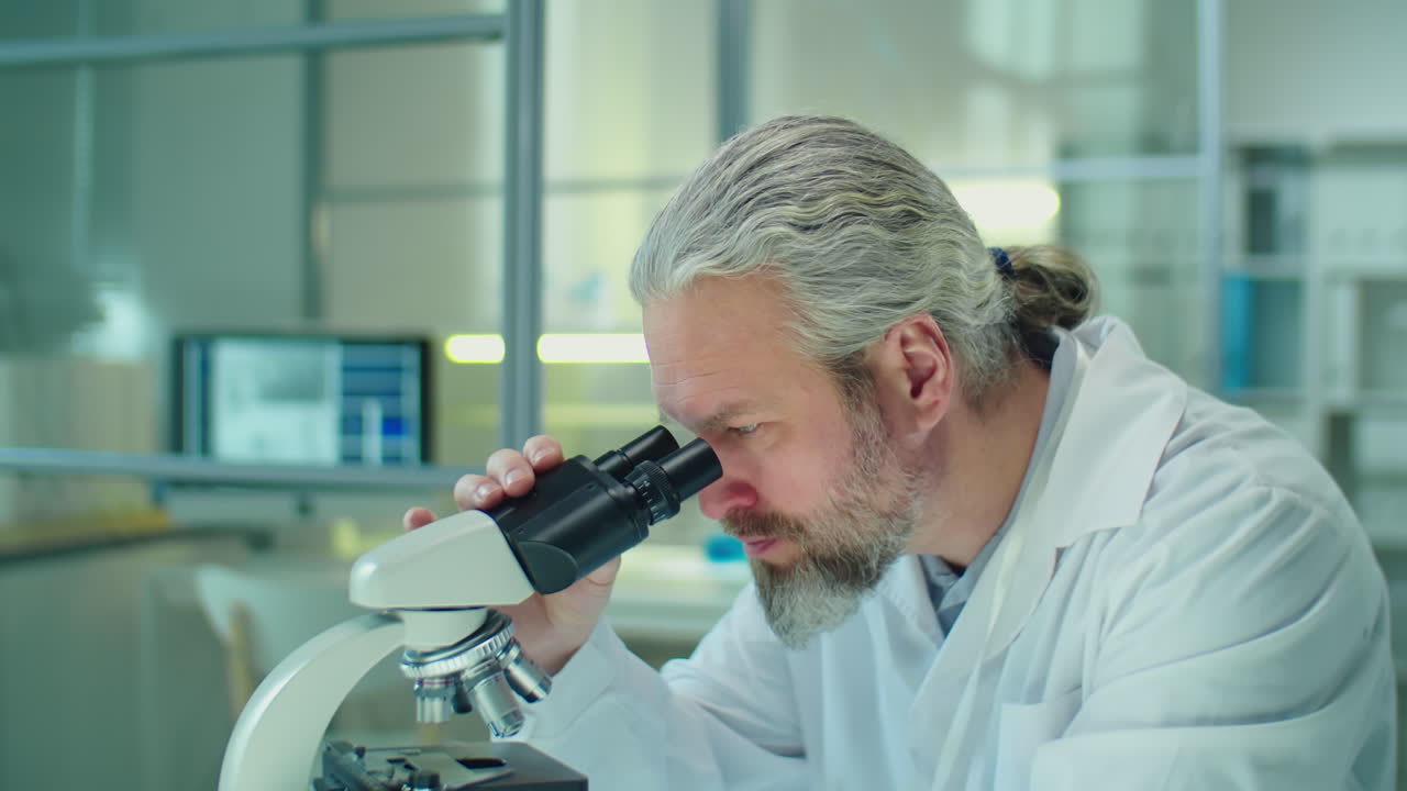 Portrait of Mature Scientist Working in Lab
