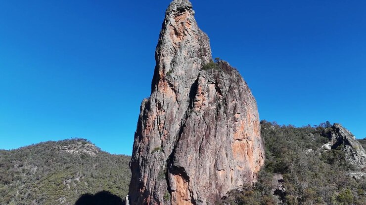 Aerial drone shot of the Breadknife rock formation in Warrumbungle National Park, Australia.