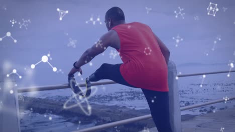 animación de redes de comunicación sobre atleta masculino con cuchilla de correr estirándose al aire libre