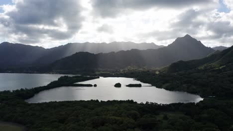 Push-in-aerial-shot-of-an-ancient-coastal-Hawaiian-fishpond-in-O'ahu