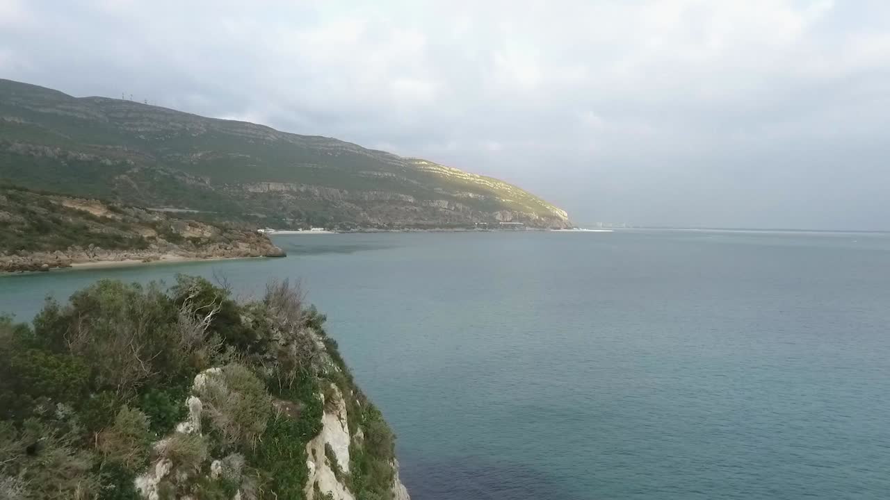 Aerial view showing the zoological reserve Pedra da Anicha (in the beauty Arrabida Natural Park, Portugal), with many seagulls and sea geeses